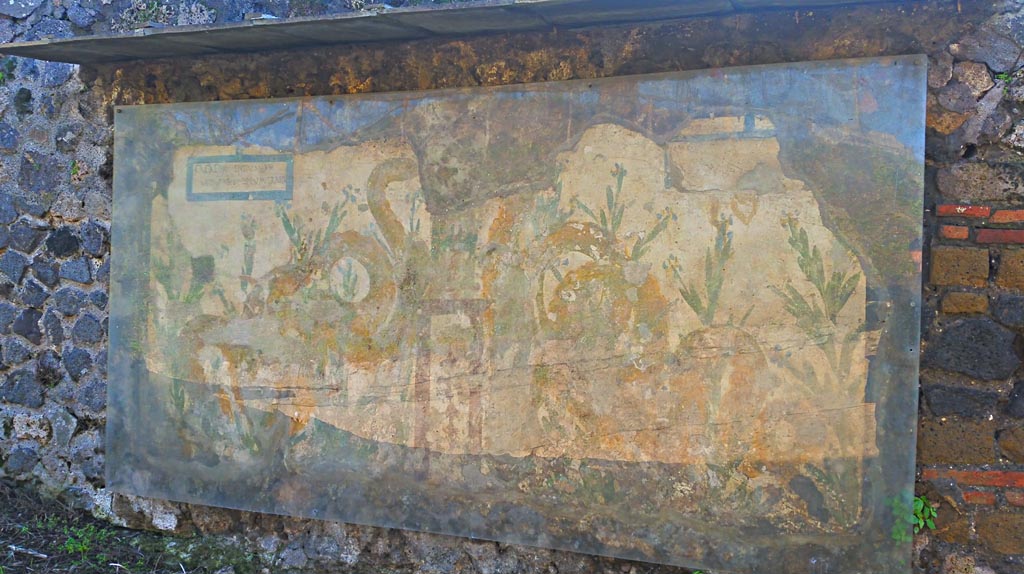Painted street shrine on the wall at V.6.19. December 2005.