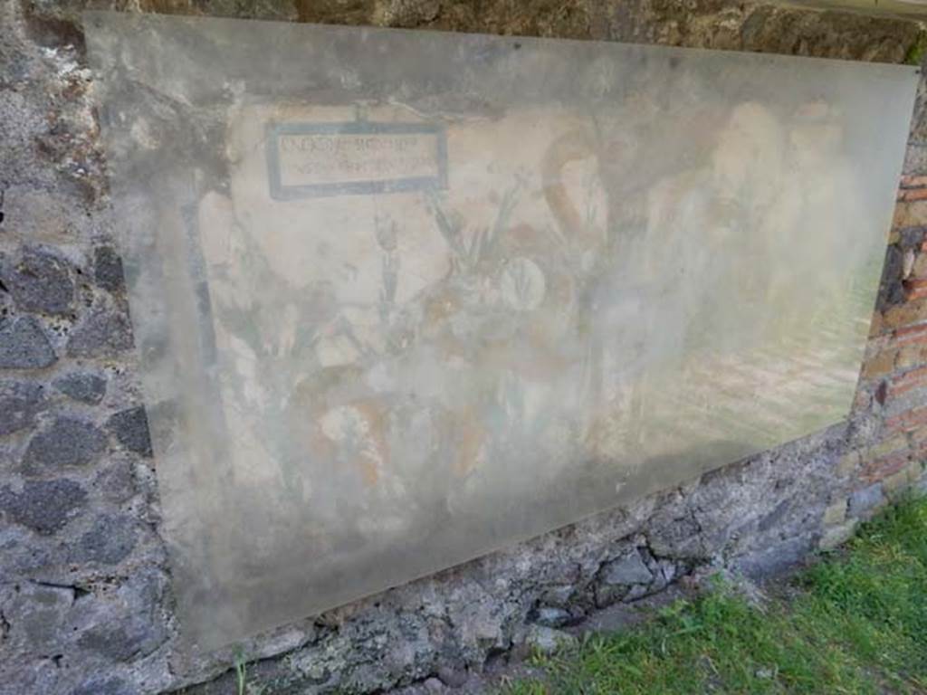 Painted street shrine on the wall at V.6.19. December 2005.
