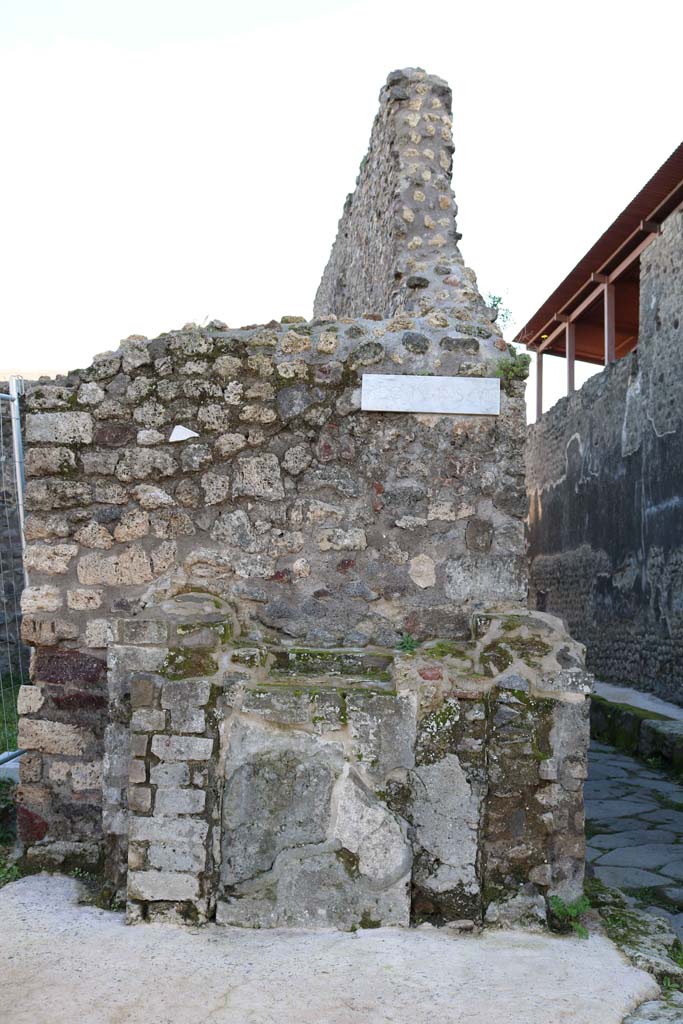 IX.8.1 Pompeii. December 2018.
Looking south to street altar on Via di Nola. Photo courtesy of Aude Durand.