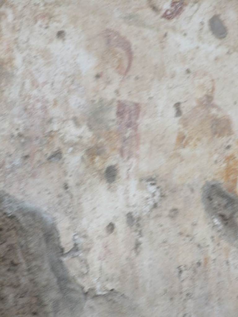 Detail of Minerva outside IX.11.1. December 2006. Minerva: Green Chiton, red coat and Corinthian helmet, on the chest the Gorgoneion, with lance to the left and shield on the ground to the right. See Lararien und Fassadenbilder in den Vesuvstadten by Thomas Frohlich, F66, page 335-337.