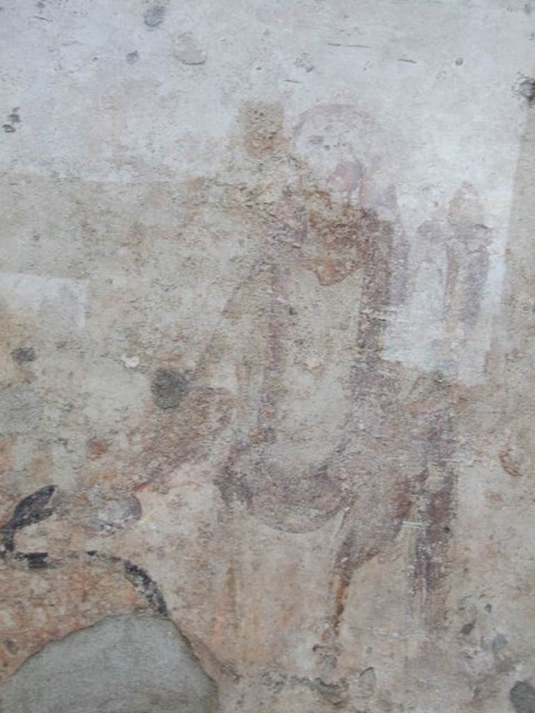 Detail of painted Genius, perhaps Augustus, outside IX.11.1. December 2006.