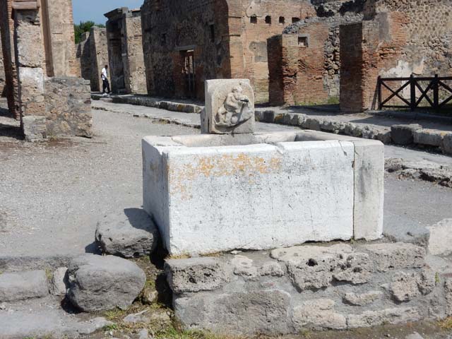 Fountain outside VI.14.17. May 2005. Marble relief of Silenus as fountain god.