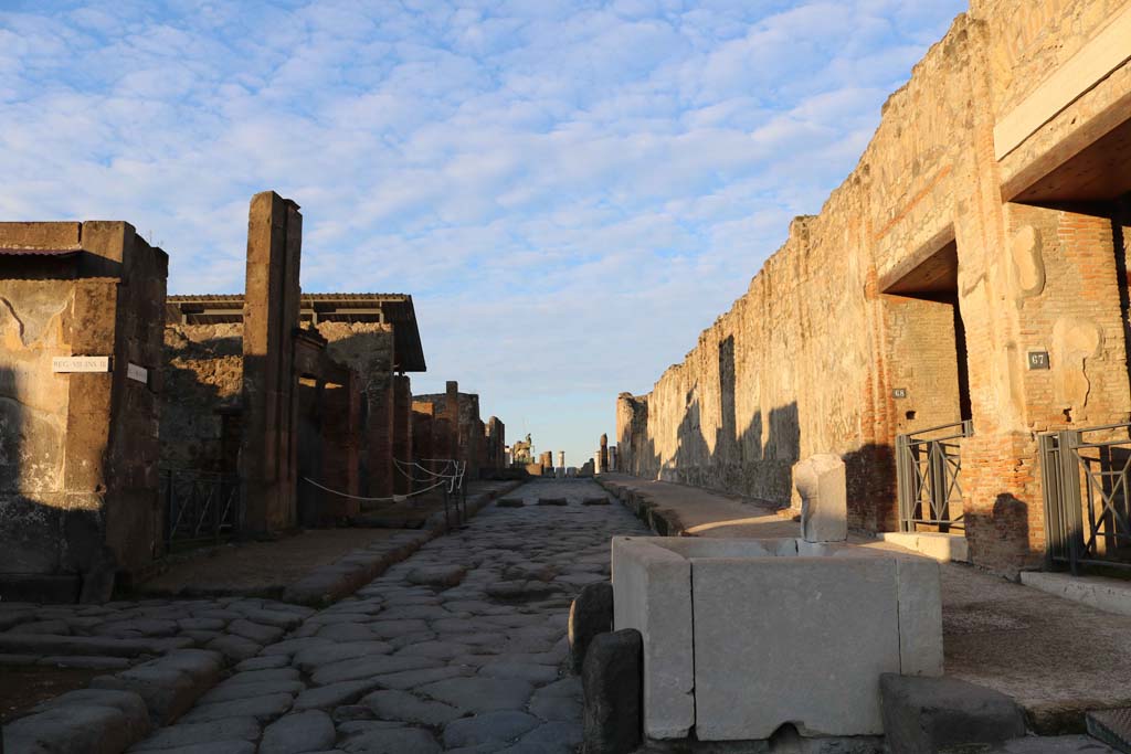 Fountain outside VII.9.67. Via dell�Abbondanza, Pompeii. December 2018.
Looking west between VIII.3, on left, and VII.9.68 and 67, on right. Photo courtesy of Aude Durand.

