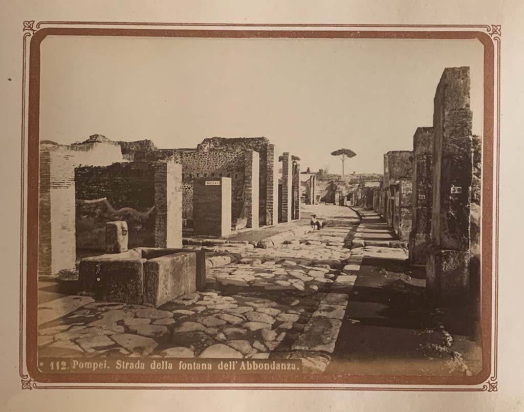 Fountain outside VII.14.13 and VII.14.14 on Via dell�Abbondanza, Pompeii. From an album by Roberto Rive, dated 1868. 
Looking east from near fountain at VII.14.13/14. Photo courtesy of Rick Bauer.
