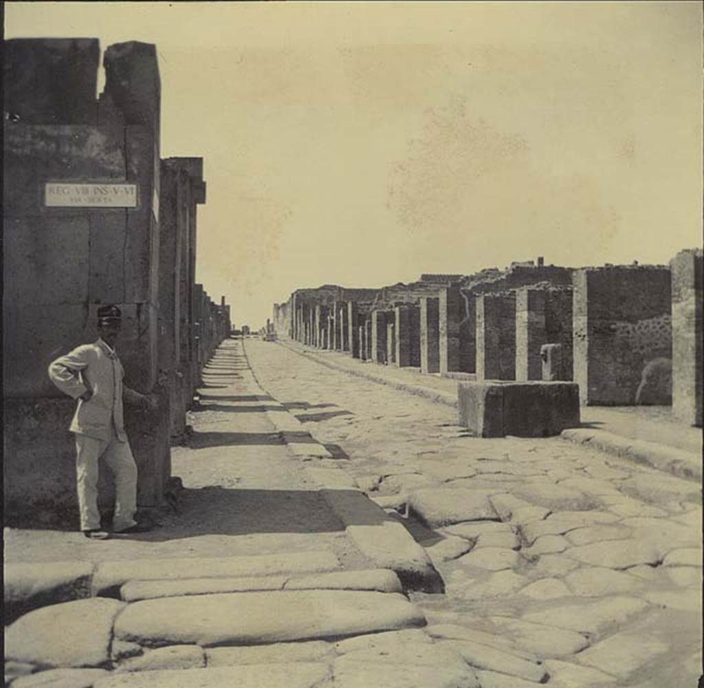Fountain outside VII.14.13 and VII.14.14 on Via dell� Abbondanza. November 1899. Looking west between VIII.5 and VII.14, from the junction with Via dei Teatri. Photo courtesy of Rick Bauer.

