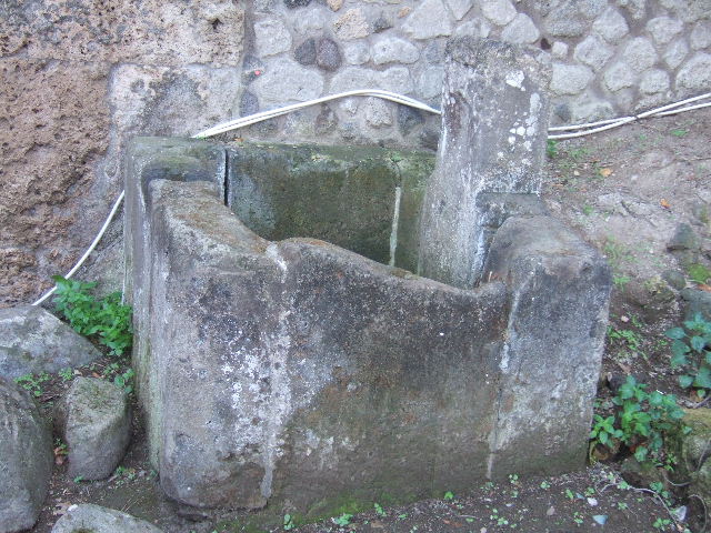 Pompeii Stabian Gate. September 2005. North west corner of gate. Fountain and drain.
