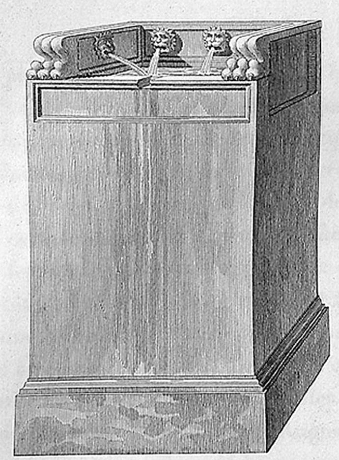 1824 drawing of fountain base with four lions� heads.
According to Mazois this was placed in the camp of soldiers when he drew it. 
It was a graceful composition and had to belong to some private building.
It was removed in 1810.
See Mazois, F., 1824. Les Ruines de Pompei: Second Partie. Paris: Firmin Didot. (p. 37 Plate III, Fig II).
According to Eschebach the remains of this fountain were removed in 1810 and have not been found again.
See Eschebach, H., 1983. Pompeii, Herculaneum, Stabiae; Bollettino dell�Associazione Internazionale Amici di Pompei 1.  (p. 30, fig 40).
