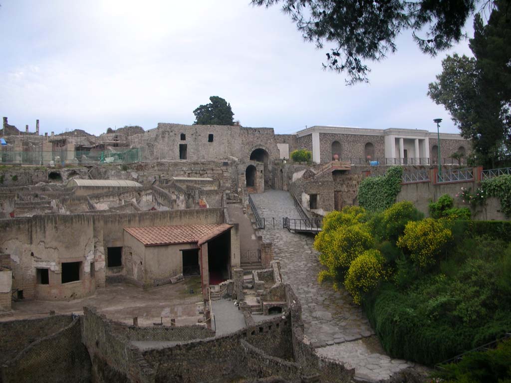 Pompeii Porta Marina. May 2010. Restoration on north side of the gate and of rear of VII.16.1.