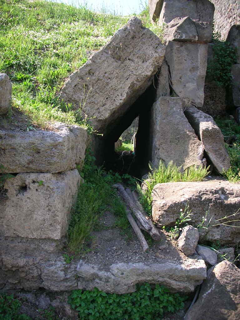 Porta di Nocera or Nuceria Gate, Pompeii. May 2010.
Looking north along course of drain, from south end on west side of gate. Photo courtesy of Ivo van der Graaff.