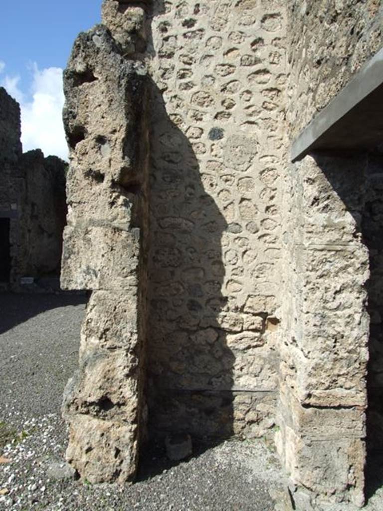 V.2.1 Pompeii. March 2009. Room 1, recess “t” in north-east corner of atrium, outside room 3.
According to BdI –
“The recess/niche “t” was the lararium whose painted decorations were divided into three zones.
It was very ruined at the time of excavation, from the base –
Serpent near an altar, Fortuna with rudder and cornucopia, garlands and birds.”
According to PPM –
“The paintings, nearly vanished, were divided into three zones.
In the first (at the top) the painting in the middle was destroyed, on both sides there was a bird sitting above a garland
The second zone in the middle, had Fortuna (0.15 high) holding the rudder in her lowered right hand, and the cornucopia in the left hand; on both sides it seems that there was nothing but plants/herbs/grass?
The third zone contained a serpent with a crest, approaching the altar towards the left.
See Bullettino dell’Instituto di Corrispondenza Archeologica (DAIR), 1885, (p.159).
See Boyce G. K., 1937. Corpus of the Lararia of Pompeii. Rome: MAAR 14, (p.33, no.83).
See Carratelli, G. P., 1990-2003. Pompei: Pitture e Mosaici: Vol. III. Roma: Istituto della enciclopedia italiana, (p.773).
See Giacobello, F., 2008. Larari Pompeiani: Iconografia e culto dei Lari in ambito domestico. Milano: LED Edizioni, (p.294, no.P2)