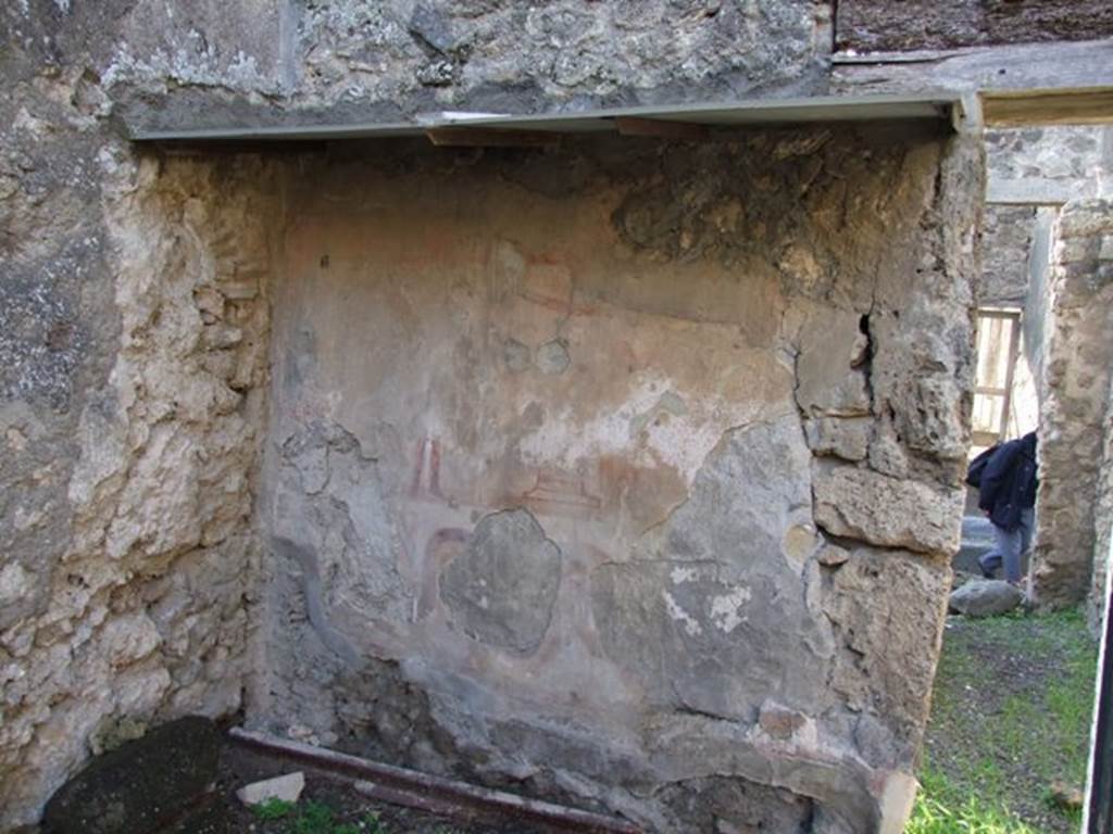 V.2.b Pompeii. December 2007. Lararium on west wall of room “b” behind the bar of V.2.b. See Fröhlich, T., 1991, Lararien und Fassadenbilder in den Vesuvstädten. Mainz: von Zabern. (L44:p.267, T. 31,2).