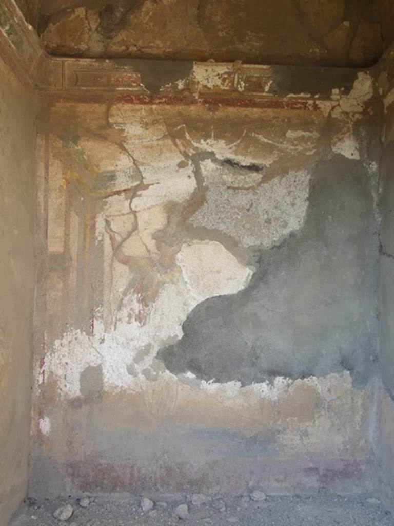 VI.7.6 Pompeii. March 2009. Rear wall of Lararium, with remains of a figure of a Lar.