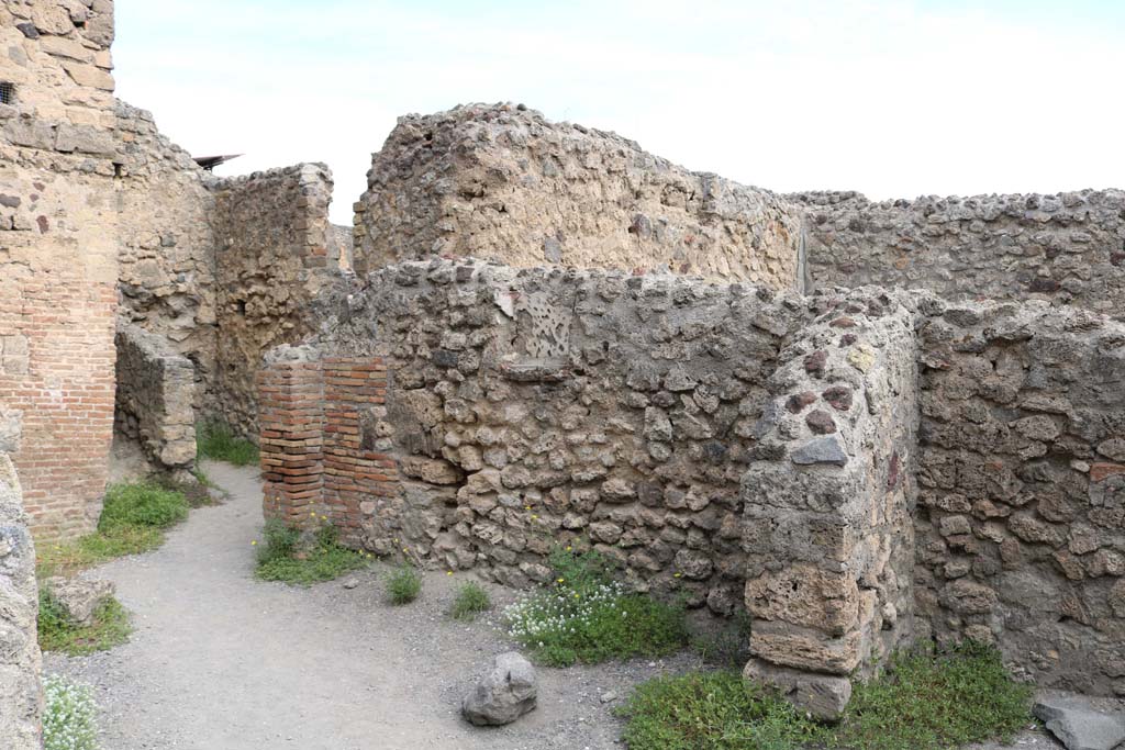 VI.8.8 Pompeii. December 2018.
Looking north-east towards two small rooms at rear, and east wall with niche. Photo courtesy of Aude Durand.
According to Boyce –38,
In the east wall of one of the rear rooms is a rectangular niche (h.0.38, w.0.40, d.0.14, h. above floor 1.35), its inside walls decorated with red lines and spots on a white ground, its floor projecting like a narrow shelf; Fiorelli called it la nicchia dei Penati.
See Fiorelli, Descrizione, 121.
See Boyce G. K., 1937. Corpus of the Lararia of Pompeii. Rome: MAAR 14, (p.49, no. 169).