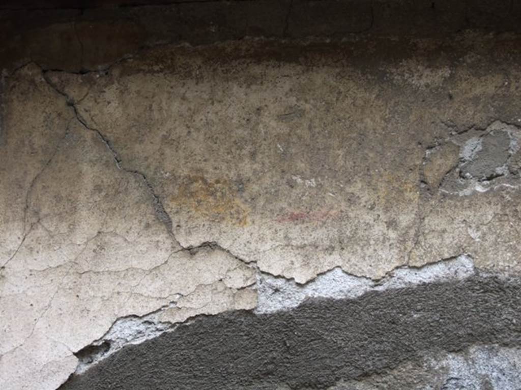VI.11.9 Pompeii. March 2009. Room 13, kitchen. Detail of painted decoration on square niche on south wall.
Painted on the rear wall was a painting of the Genius, but today faded and no longer recognisable.
In the front of the niche, there was originally a small brick altar.
See Giacobello, F., 2008. Larari Pompeiani: Iconografia e culto dei Lari in ambito domestico. Milano: LED Edizioni. (p.177)