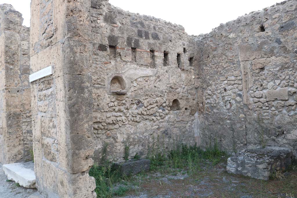 VI.13.7 Pompeii. December 2018. Looking towards west wall of shop on Via della Fortuna. Photo courtesy of Aude Durand.