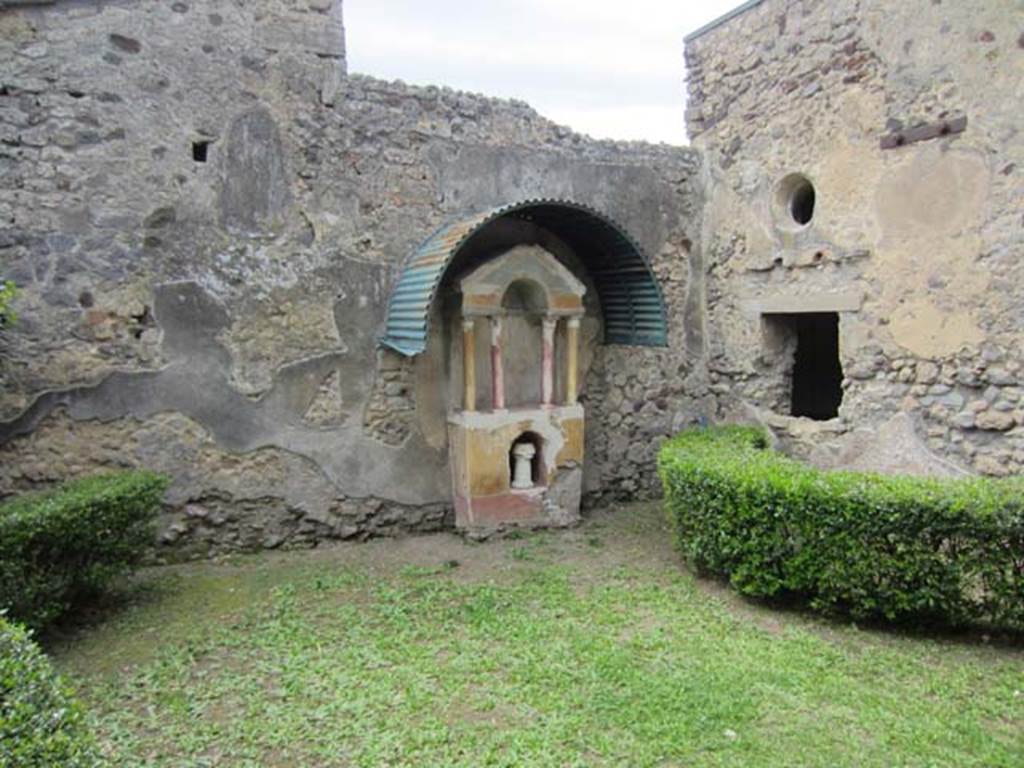 VI.15.8 Pompeii. April 2012. Looking west across garden area towards household shrine.
Photo courtesy of Marina Fuxa.