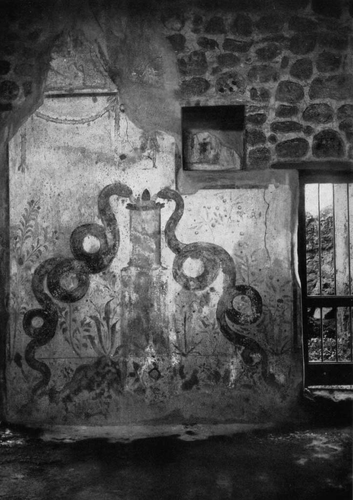 VI.16.15 Pompeii. pre-1937.
North wall of atrium with lararium between doorways to room I (left) and rooms K to M (right).
See Boyce G. K., 1937. Corpus of the Lararia of Pompeii. Rome: MAAR 14. (p.58, no.224, Pl.16,1)