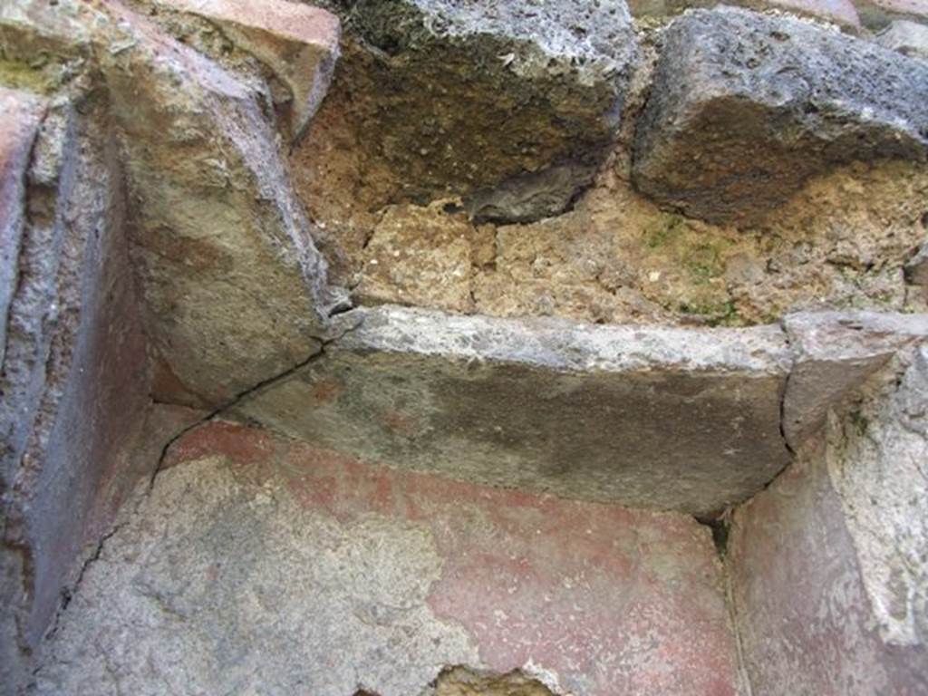 VI.16.20 Pompeii. March 2009. Top of niche, with remains of painted decoration.