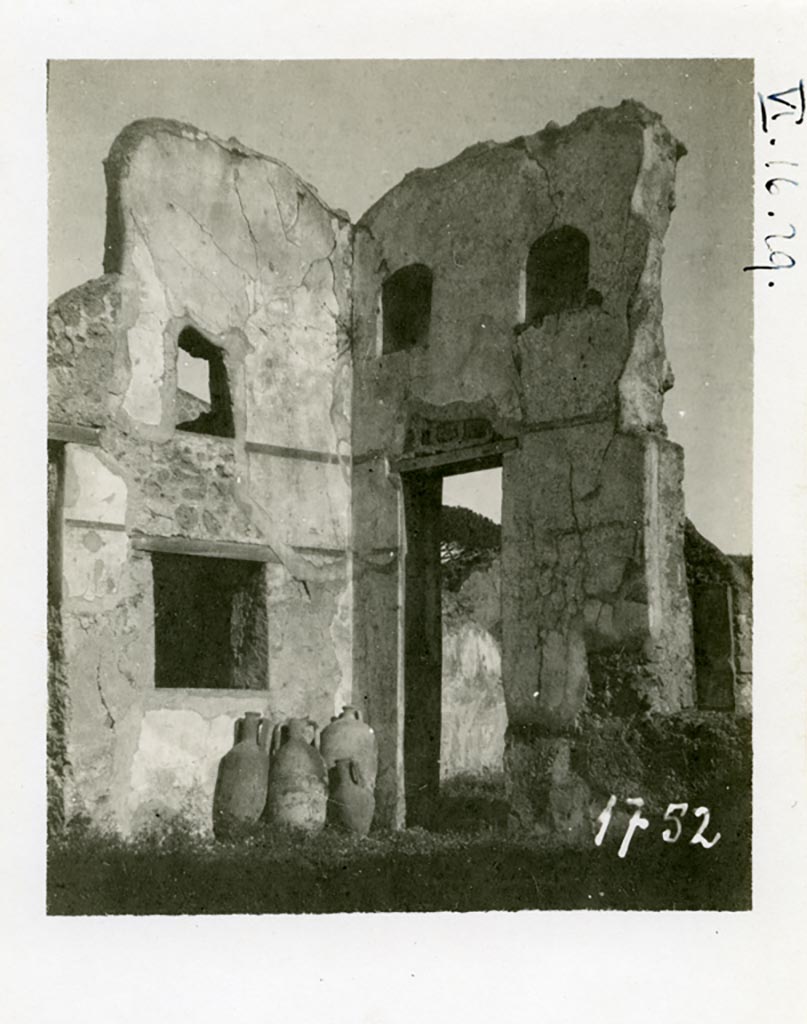 VI.16.29 Pompeii. Pre-1937-39. Looking north-east across atrium.
Photo courtesy of American Academy in Rome, Photographic Archive. Warsher collection no. 1752.
On the left would have been the doorway to room G, oecus fenestratum.
In the south wall of room G would have been a window overlooking the atrium, and above that in the same wall was another small window.
In the east wall was a doorway into room H.
According to Giacobello, the doorway and wall on the east side of the atrium containing two niches collapsed following the 1980 earthquake.
Today, of the two arched niches only the one on the left has been partially conserved.
They would have been a short distance away from each other and plastered inside in white stucco.
See Giacobello, F., 2008. Larari Pompeiani: Iconografia e culto dei Lari in ambito domestico. Milano: LED Edizioni. (p.243).