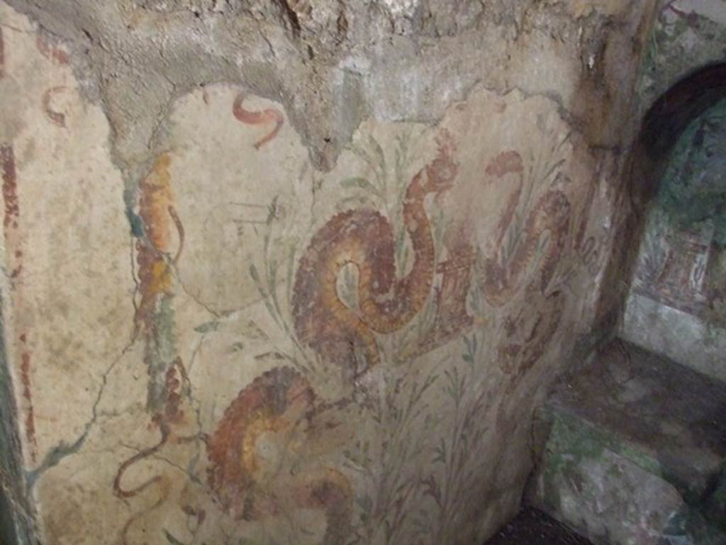 VII.2.20 Pompeii. December 2007. Sacellum. On the west wall of the room are painted two huge yellow serpents, confronting a small altar. See Boyce above.