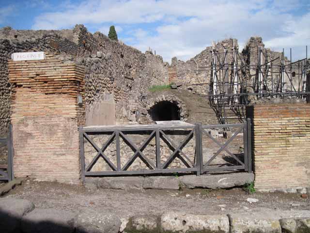 I.2.13 Pompeii. September 2010. Looking east across bar, from entrance.
Photo courtesy of Drew Baker.
