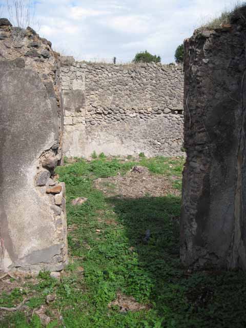 I.2.15 Pompeii. September 2010. Looking east along unnamed vicolo, from entrance doorway. Photo courtesy of Drew Baker.
