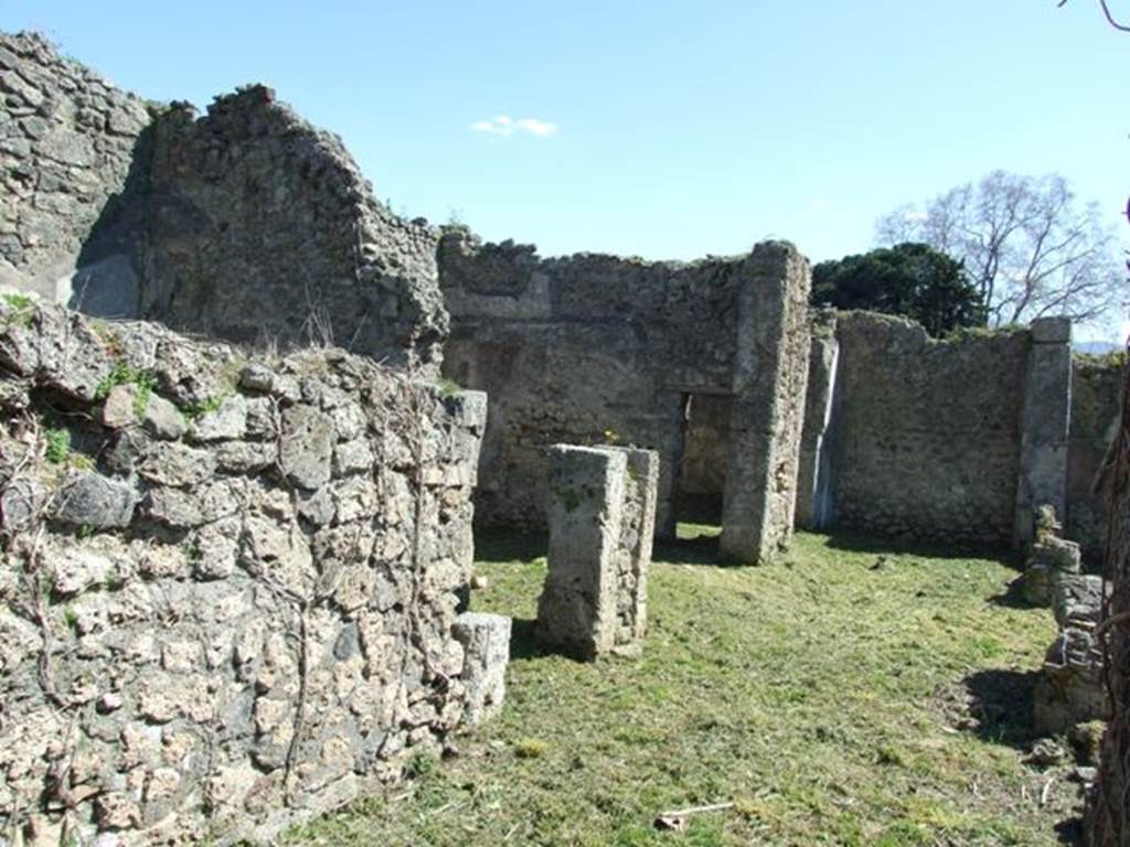 1.2.16 Pompeii. September 2010. Room 2, west wall and doorway to garden area. Photo courtesy of Drew Baker.
