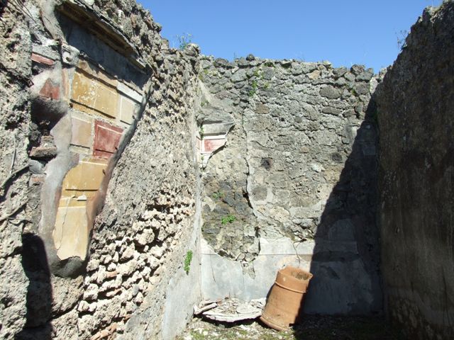 I.2.16 Pompeii. March 2009. Room 4, oecus, looking south-east through small doorway from room 3.  