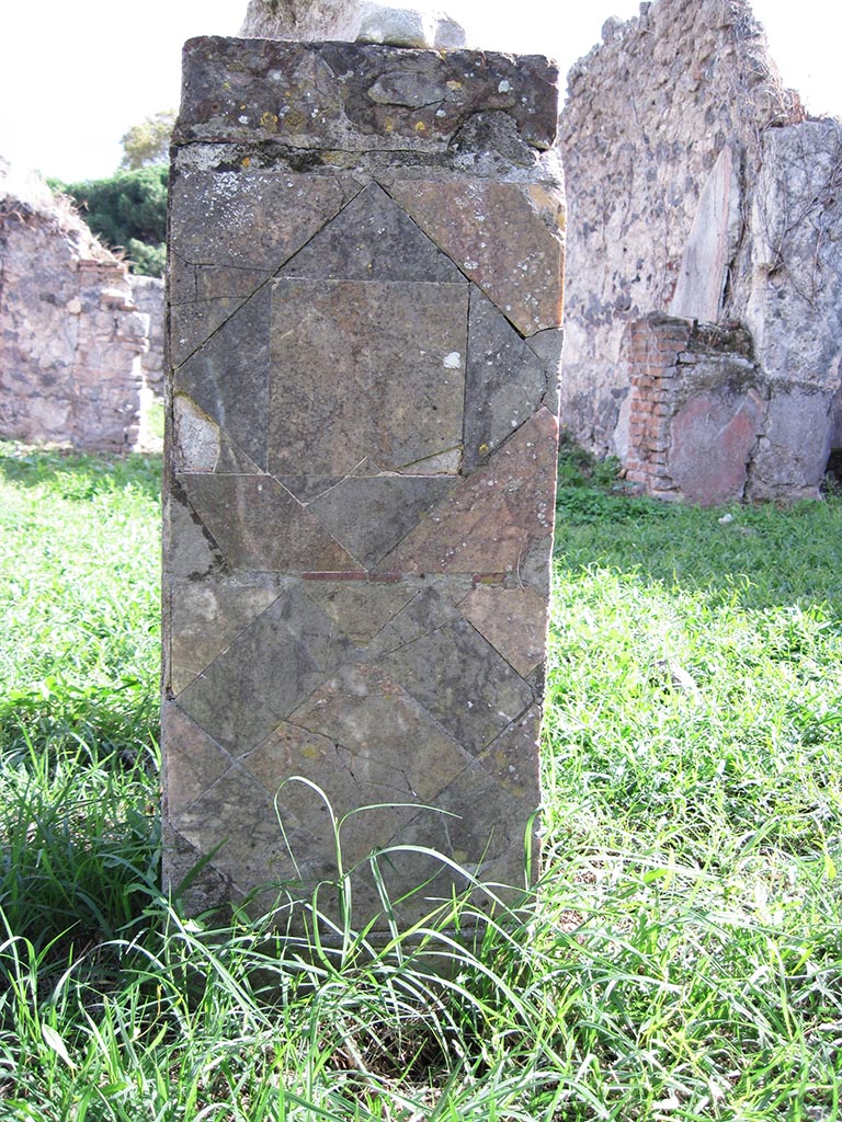 I.2.17 Pompeii. September 2010.
Detail of marble work on base in atrium, looking south. Photo courtesy of Drew Baker.