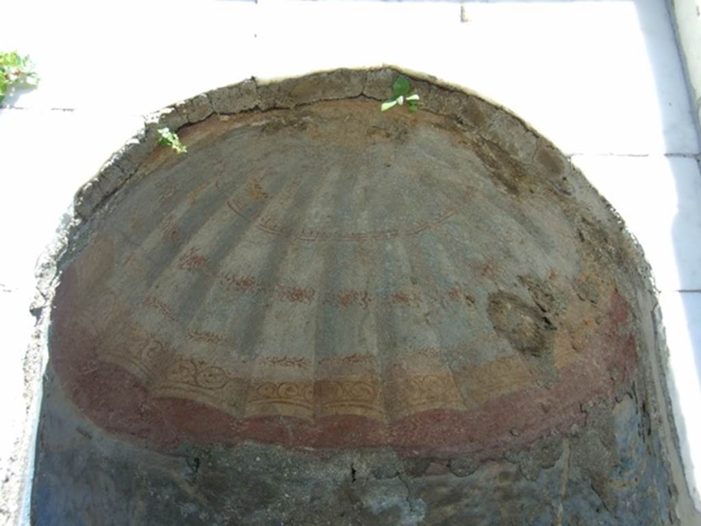 I.2.17 Pompeii. March 2009. Room 13. East wall. Ceiling of niche with shell-like fluted and painted decoration.