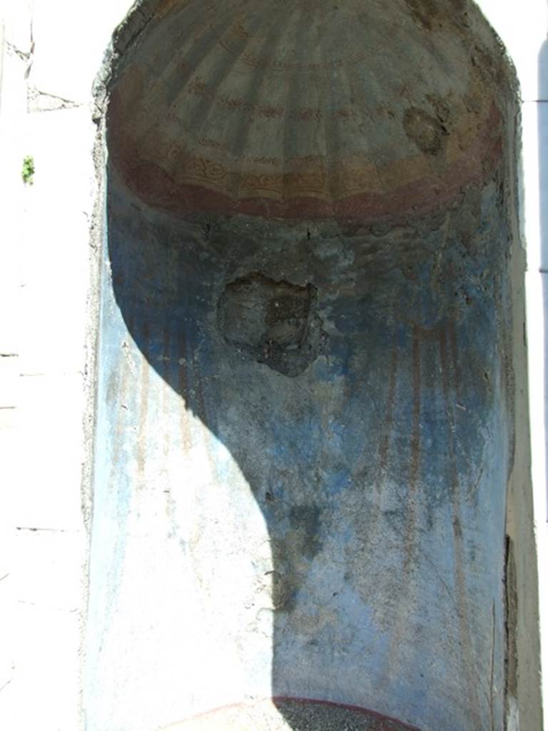 I.2.17 Pompeii. March 2009. Room 13. East wall. The wall behind the statue was painted to represent blue drapery.