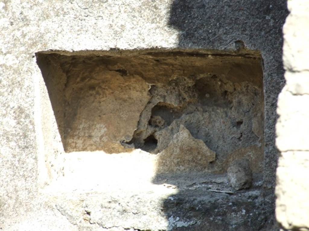 I.2.18 Pompeii. March 2009. Recess in east wall. According to Boyce, this was a rectangular niche with interior walls painted red, found on east wall of taberna. See Boyce G. K., 1937. Corpus of the Lararia of Pompeii. Rome: MAAR 14. (p.22, number 11A)