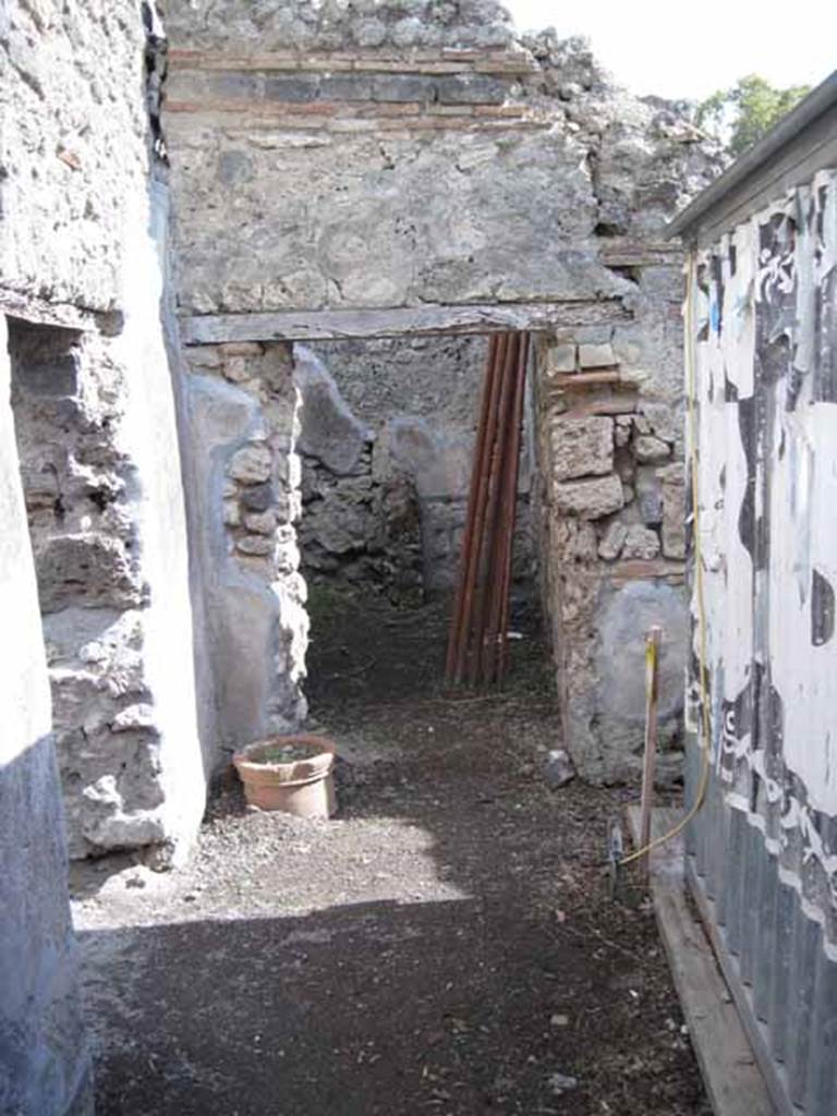.2.18 Pompeii. September 2010. Looking south from rear of bar, towards doorway of I.2.19 (on left) and doorway to room in south-east corner.
Photo courtesy of Drew Baker.