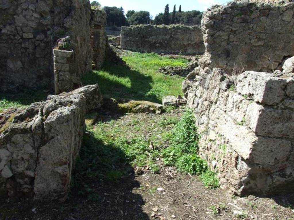 I.2.20 Pompeii. September 2010. Looking south to doorway to kitchen. Photo courtesy of Drew Baker.
