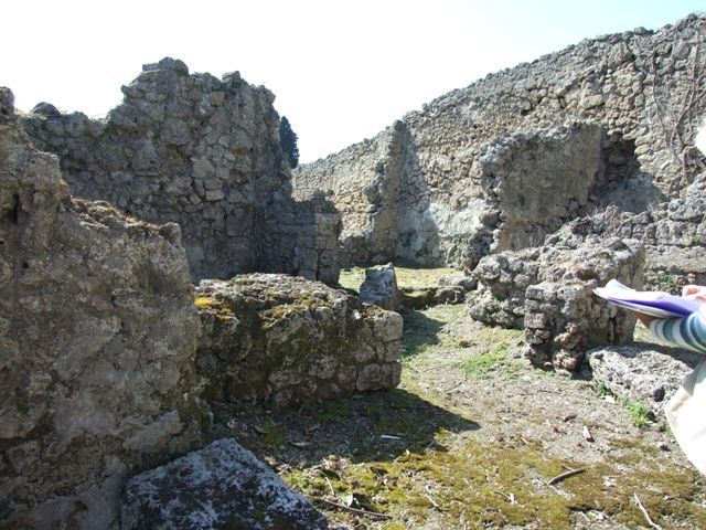 I.2.21 Pompeii. September 2010. Looking north from bar, across entrance corridor of I.2.20 to small room on north side. Photo courtesy of Drew Baker.