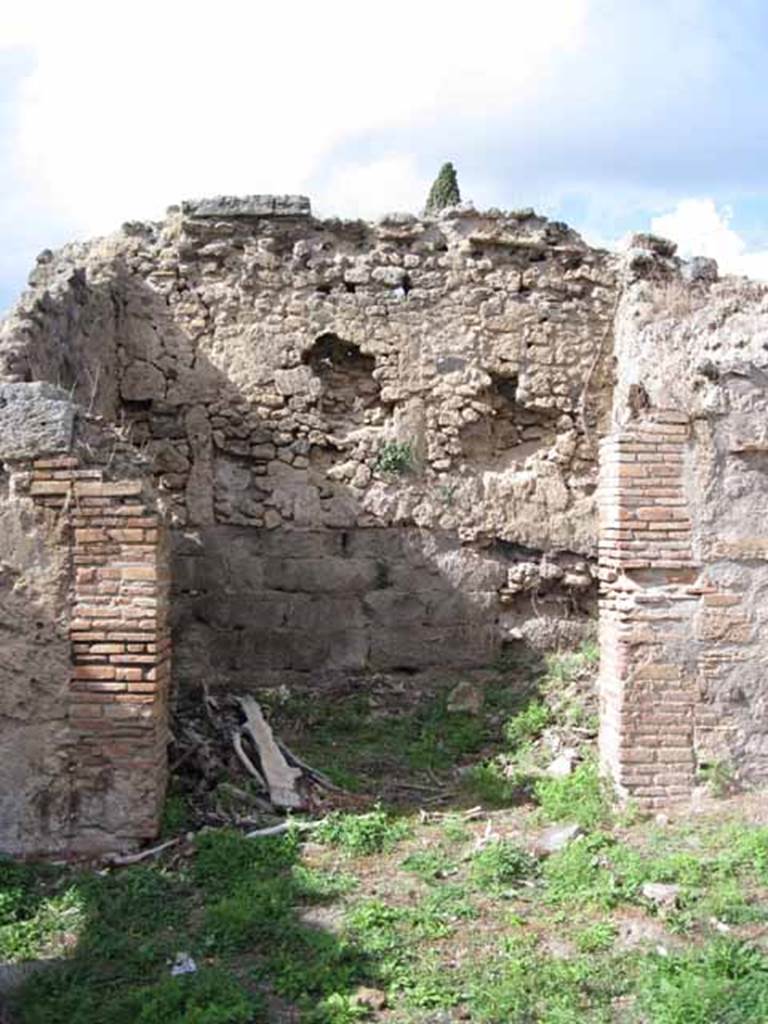 I.2.22 Pompeii. September 2010. Doorway to room 6, looking north from garden. Photo courtesy of Drew Baker.