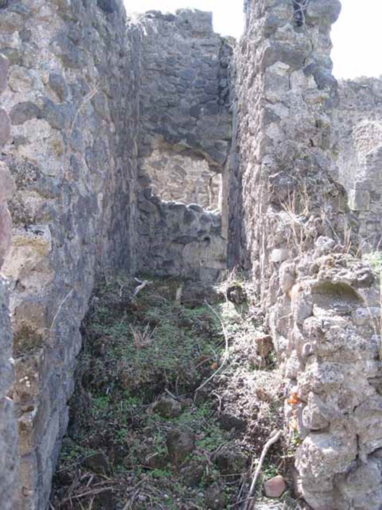 I.2.24 Pompeii. September 2010. Looking west towards stairs between the doorway to the large room, on left, and atrium, on right. Photo courtesy of Drew Baker.