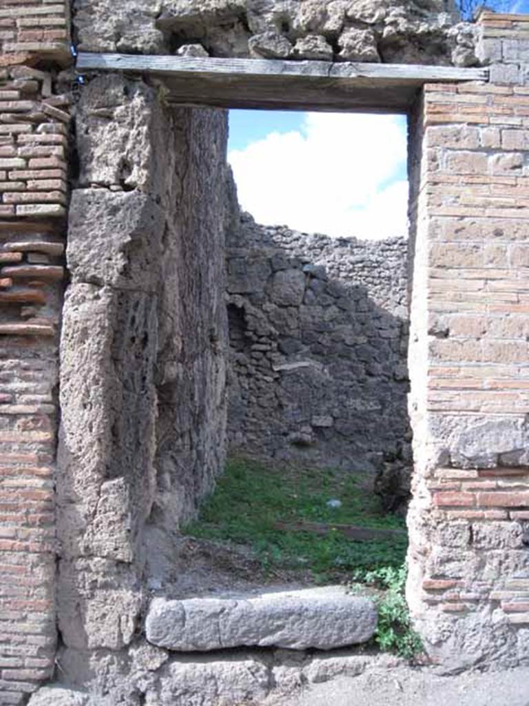 I.2.26 Pompeii. September 2010. Looking north into site of stairs to upper floor dwelling and workshop. Photo courtesy of Drew Baker.
