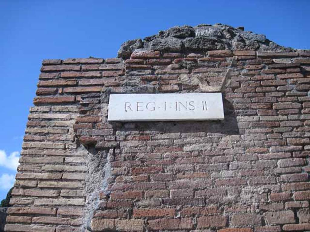 I.2.32 Pompeii. September 2010. ID insula number plate, on wall on corner of Vicolo del Conciapelle and Via Stabiana. Photo courtesy of Drew Baker.