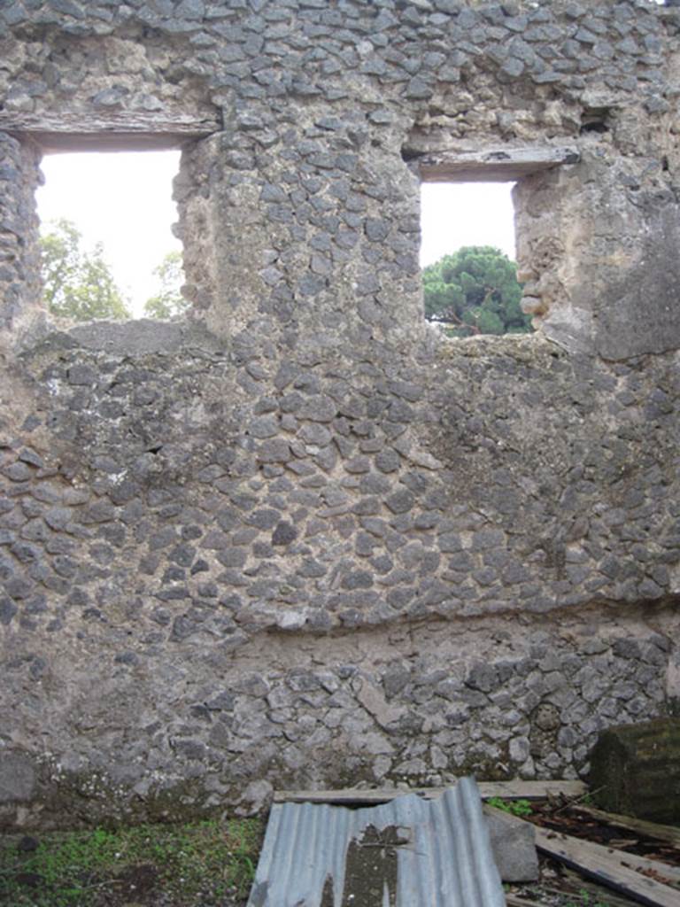 I.3.1 Pompeii. September 2010. South wall of rear room with windows overlooking small unnamed vicolo. Photo courtesy of Drew Baker.