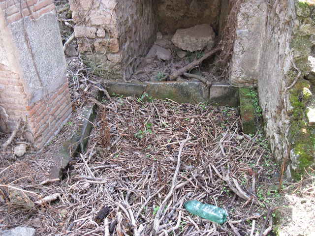 I.3.3 Pompeii. September 2010. Subterranean Level, looking east from yard room towards east wall with two doorways. Photo courtesy of Drew Baker.

