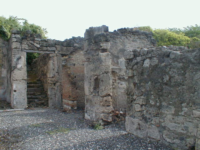 I.3.3 Pompeii. September 2010. East wall and south-east corner of small room, storeroom or cupboard.  Photo courtesy of Drew Baker.

