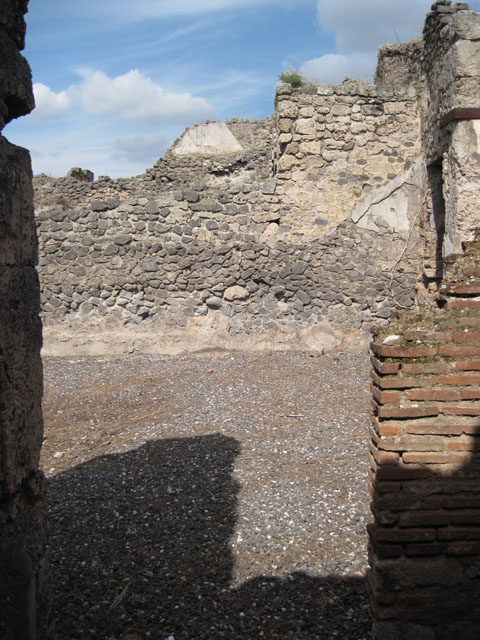 I.3.3 Pompeii. September 2010.  Looking north across atrium through doorway from room in south-western corner of atrium.  Photo courtesy of Drew Baker.
