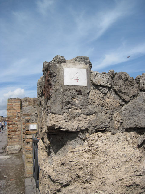 I.3.4 Pompeii. September 2010. Looking east across Via Stabiana towards entrance doorway. Photo courtesy of Drew Baker. 
According to CTP, the street entrance was walled up as of April 1982. See Van der Poel, H. B., 1986. Corpus Topographicum Pompeianum, Part IIIA. Austin: University of Texas. (p.6)
