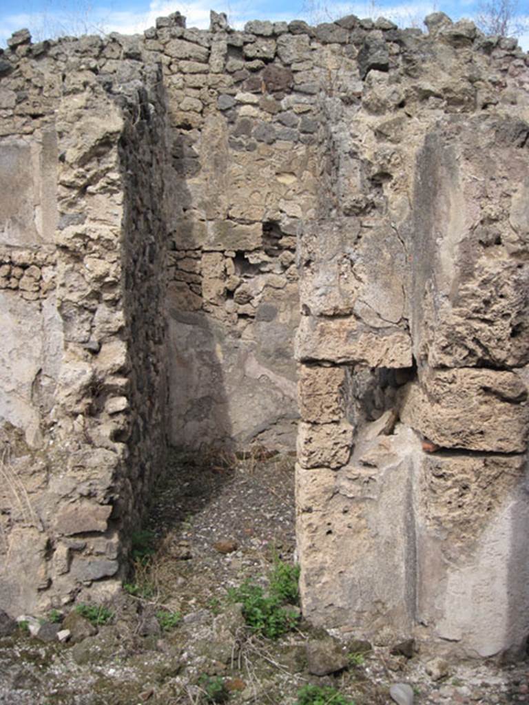 I.3.8b Pompeii. September 2010. Looking north to doorway to small room, described by Fiorelli as l’apotheca. Photo courtesy of Drew Baker.