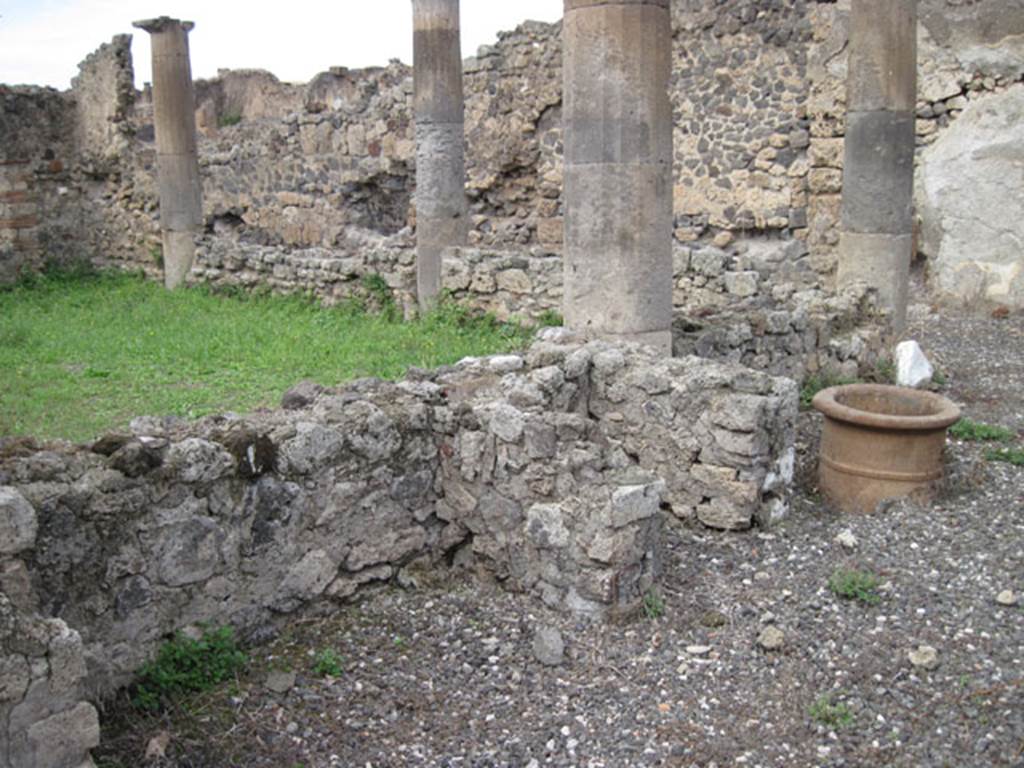 I.3.8b Pompeii. September 2010. Looking towards features near west garden wall of east portico. Photo courtesy of Drew Baker.
See Jashemski, W. F., 1993. The Gardens of Pompeii, Volume II: Appendices. New York: Caratzas. (p.26).
According to Warscher, “Non è rimasto niente della testa di Vulcano menzionata dal Mau (Bull. Inst. 1871, p. 171). Ma questo testa non è sola testa di terracotta che è stata trovata sul forno di Pompei: prima di quella hanno scavato il forno nel pistrino IX.1.3/30, nel quale è incastrata una testa – del Vulcano o forse dello spirito del fuoco – anche di terracotta, ma di quest’ultima io non ho trovato nessuna menzione. (vedi, il mio Codex Topographicus di Pompei IX, 1). Anche in questo caso sotto la testa di terracotta si trova un fallo”.
See Warscher, T, 1935: Codex Topographicus Pompejanus, Regio I, 3:Rome, DAIR.
(translation: “Nothing remained of the head of Vulcan mentioned by Mau (Bull. Inst. 1871, p.171) But this head was not the only terracotta head that had been found on a Pompeii oven: before this they had excavated the oven in the bakery in IX.1.3/30, in which was embedded a head – of Vulcan or maybe of the spirit of the fire, – also in terracotta, but of this last I have found no mention. (see my Codex Topographicus of Pompeii IX, 1).
Also in that case, a phallus was found under the terracotta head.”)