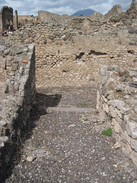 I.3.8a Pompeii. September 2010. Looking south to possible room in south-east corner of property. Photo courtesy of Drew Baker.

