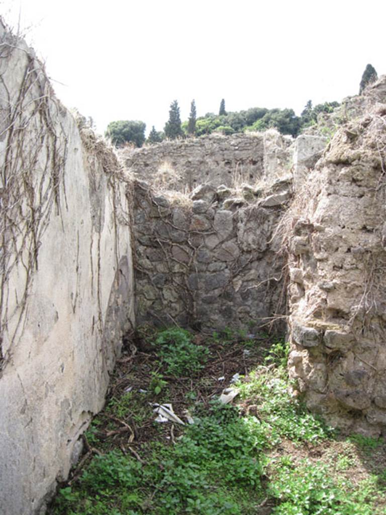 I.3.27 Pompeii. September 2010. Looking north to circular feature in centre of north wall of bakery room. Photo courtesy of Drew Baker.