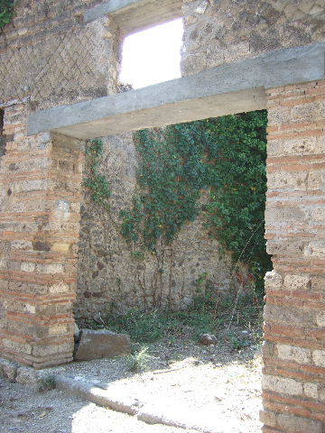 I.3.27 Pompeii. September 2010. Looking towards north wall, and north-east corner with recess. Photo courtesy of Drew Baker.
