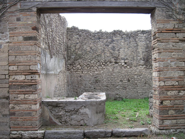 I.3.28 Pompeii. September 2010. ID number plate on south side of entrance doorway. Photo courtesy of Drew Baker.